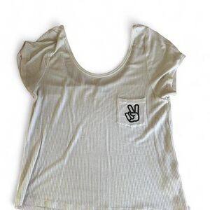 Trendy Cream Crop Top with Peace Sign Pocket